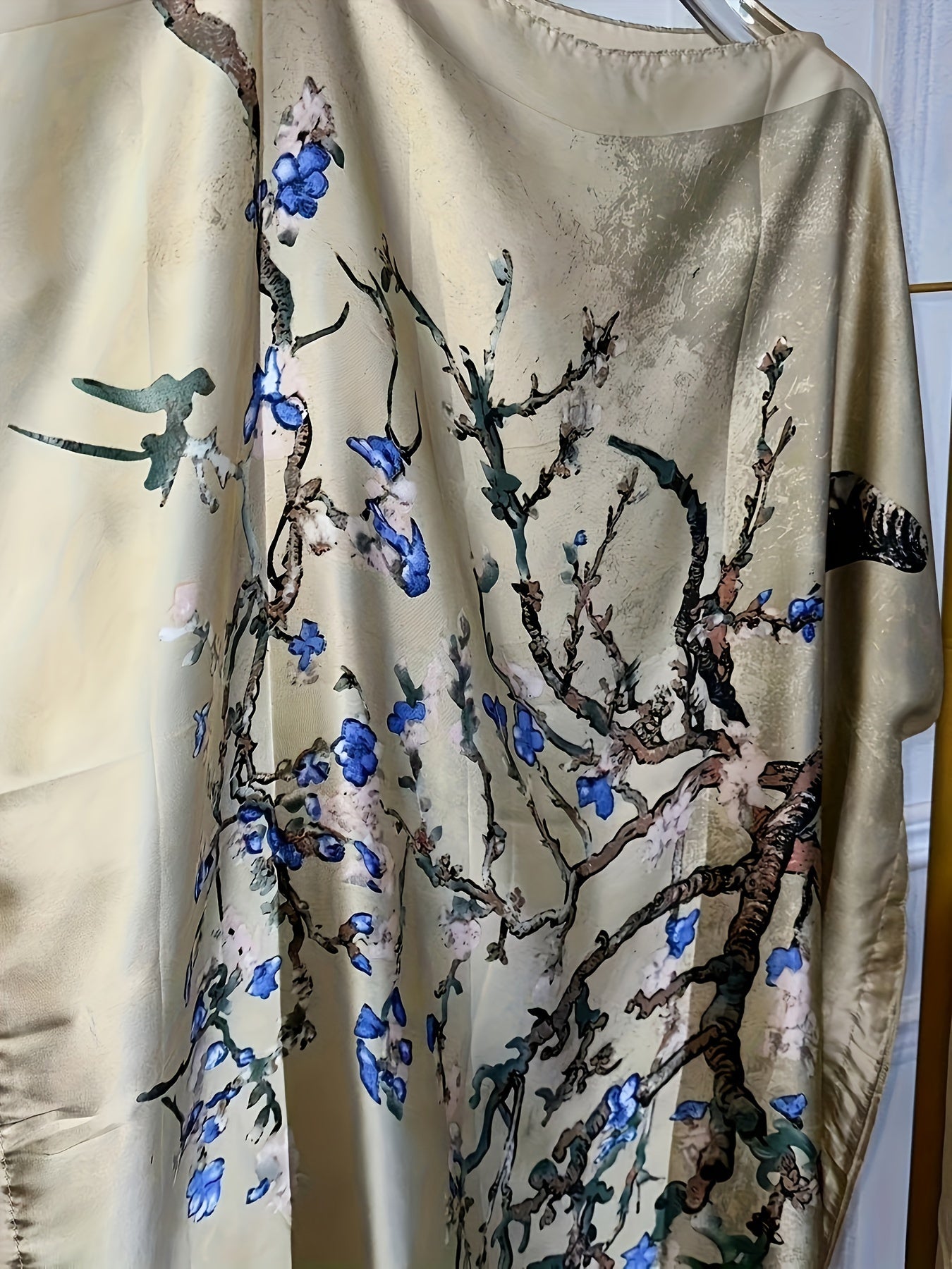 Elegant Floral Print Abaya Set with Batwing Sleeves and Draped Asymmetrical Hem
