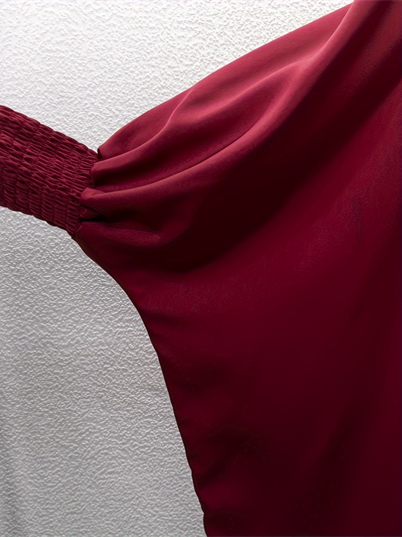 Women's One-Piece Prayer Jilbaab Dress Featuring a Hooded Design And Smocking Sleeves, Suitable for Islamic Attire, Available in Black, Inspired by Turkish Modest Fashion.