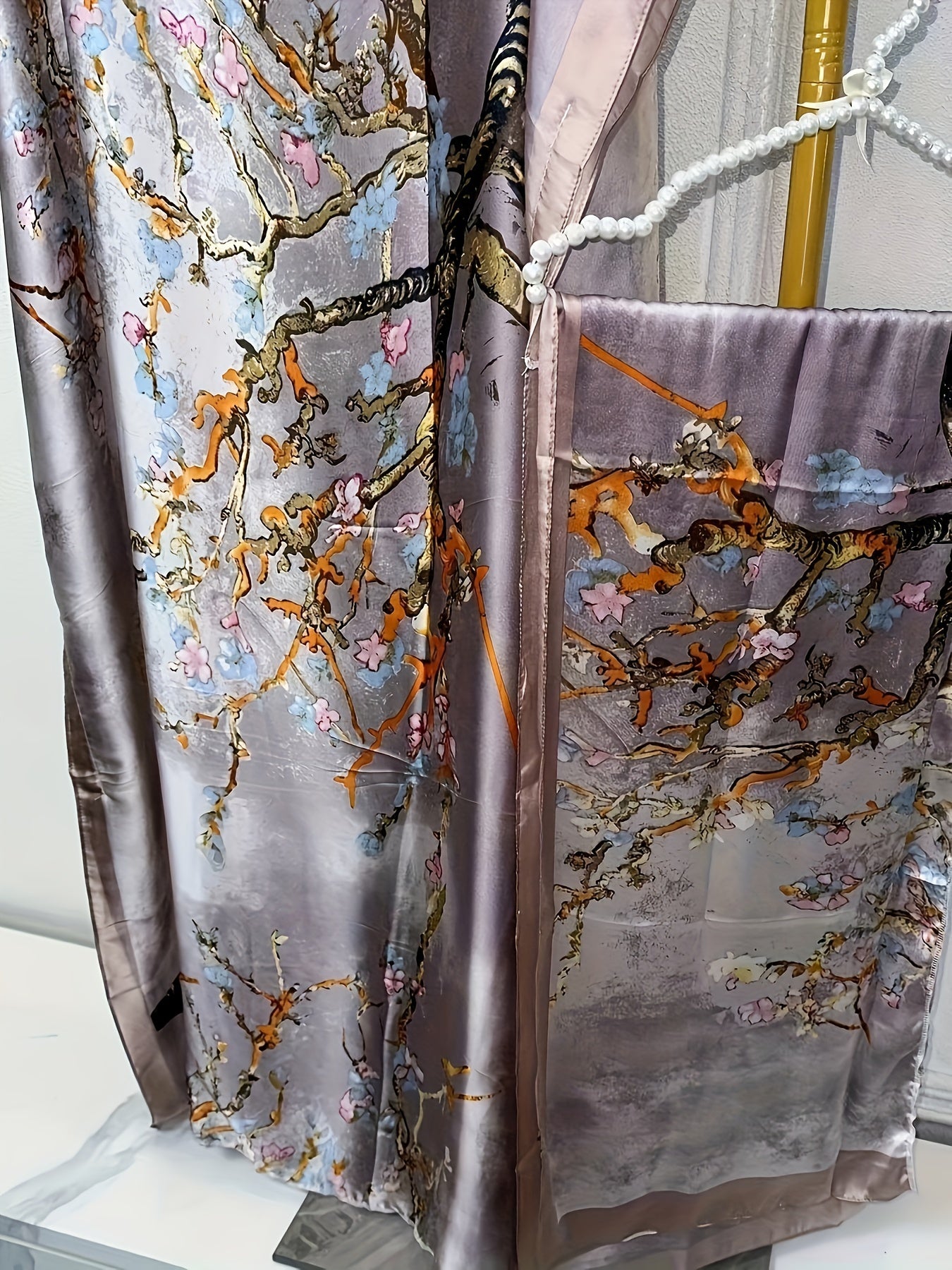 Elegant Floral Print Abaya Set with Batwing Sleeves and Draped Asymmetrical Hem