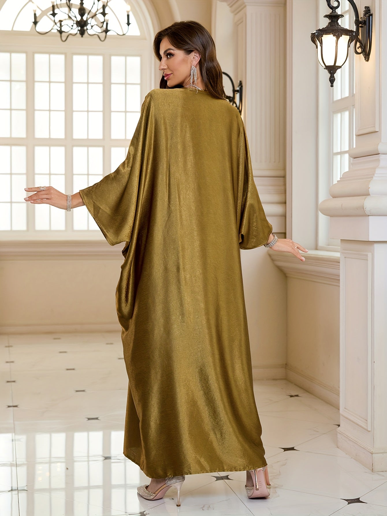 Elegant V-Neck Golden Kaftan with Butterfly Sequin Embellishments - Loose Fit, Long Sleeve, Traditional Middle Eastern Abaya, Spring/Summer/Fall Wear, Elegant Attire | Golden Embellishments | Detailed Design