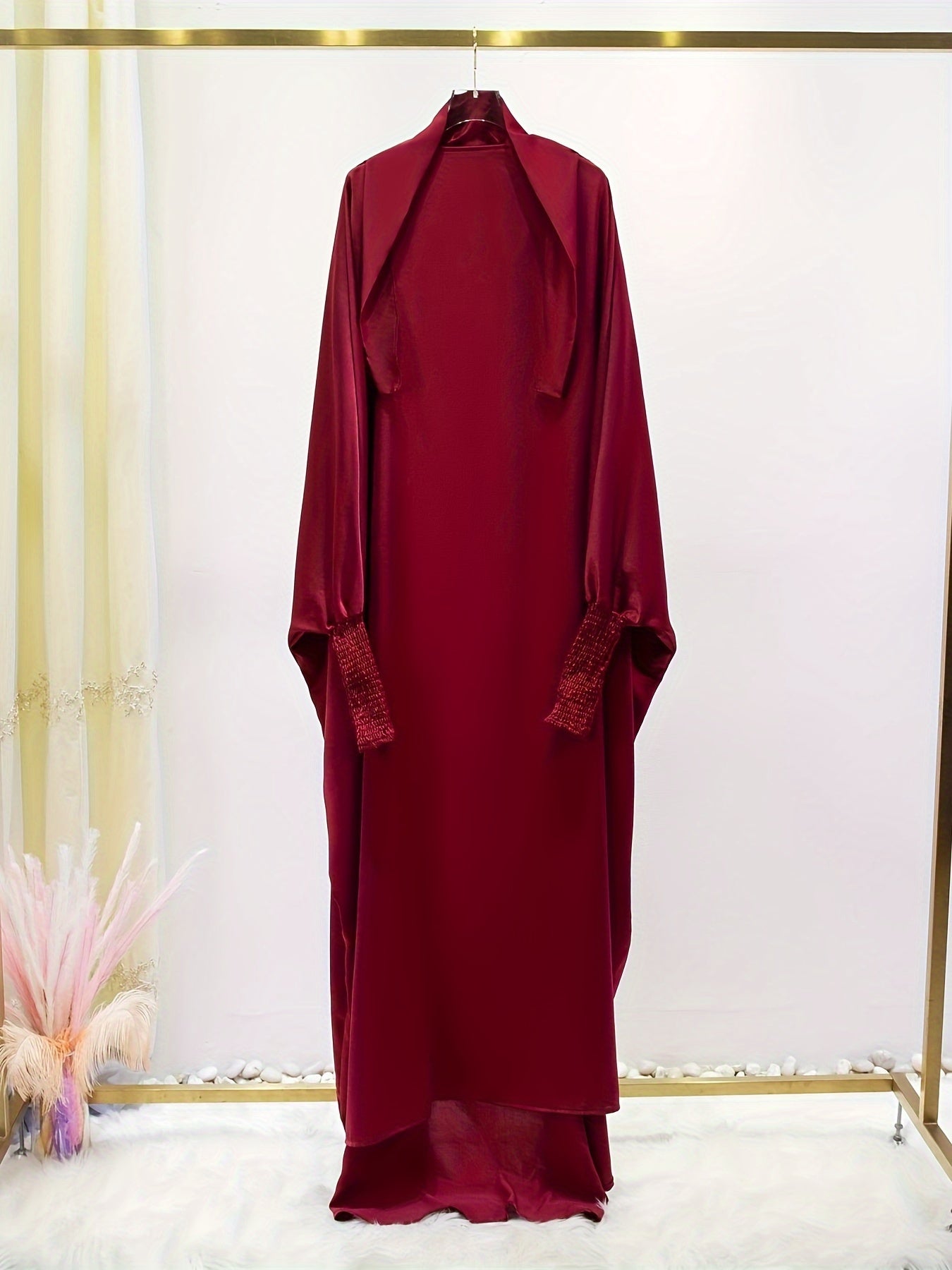 Women's One-Piece Prayer Jilbaab Dress Featuring a Hooded Design And Smocking Sleeves, Suitable for Islamic Attire, Available in Black, Inspired by Turkish Modest Fashion.