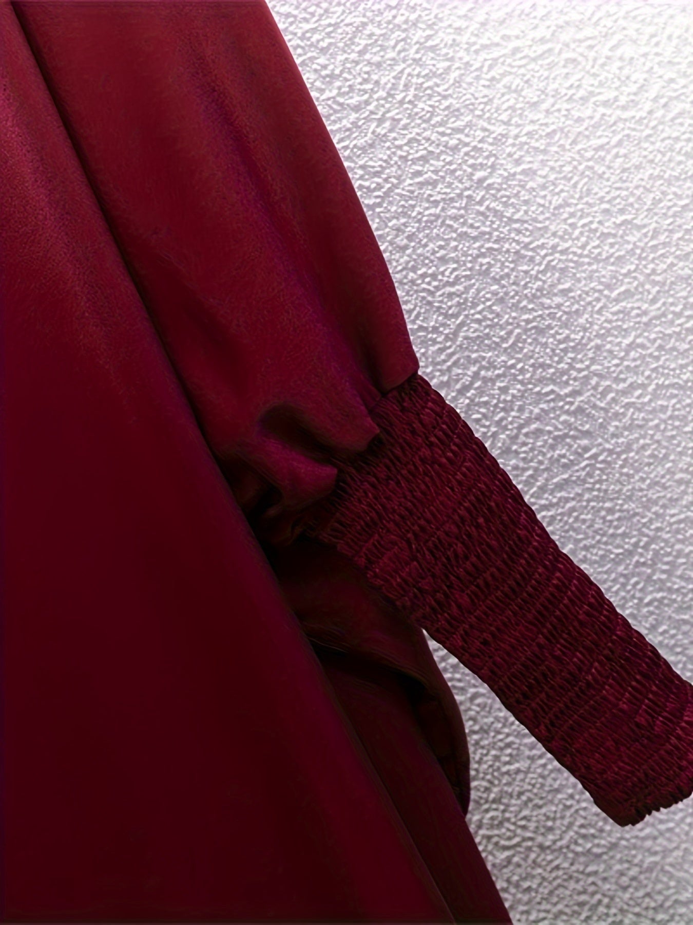 Women's One-Piece Prayer Jilbaab Dress Featuring a Hooded Design And Smocking Sleeves, Suitable for Islamic Attire, Available in Black, Inspired by Turkish Modest Fashion.