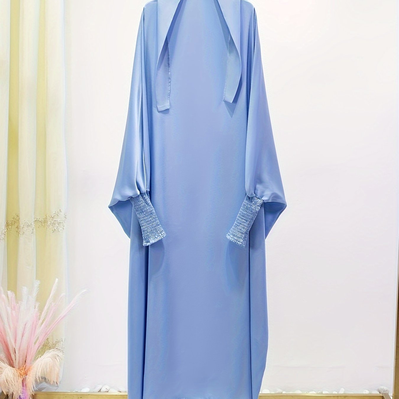 Women's One-Piece Prayer Jilbaab Dress Featuring a Hooded Design And Smocking Sleeves, Suitable for Islamic Attire, Available in Black, Inspired by Turkish Modest Fashion.