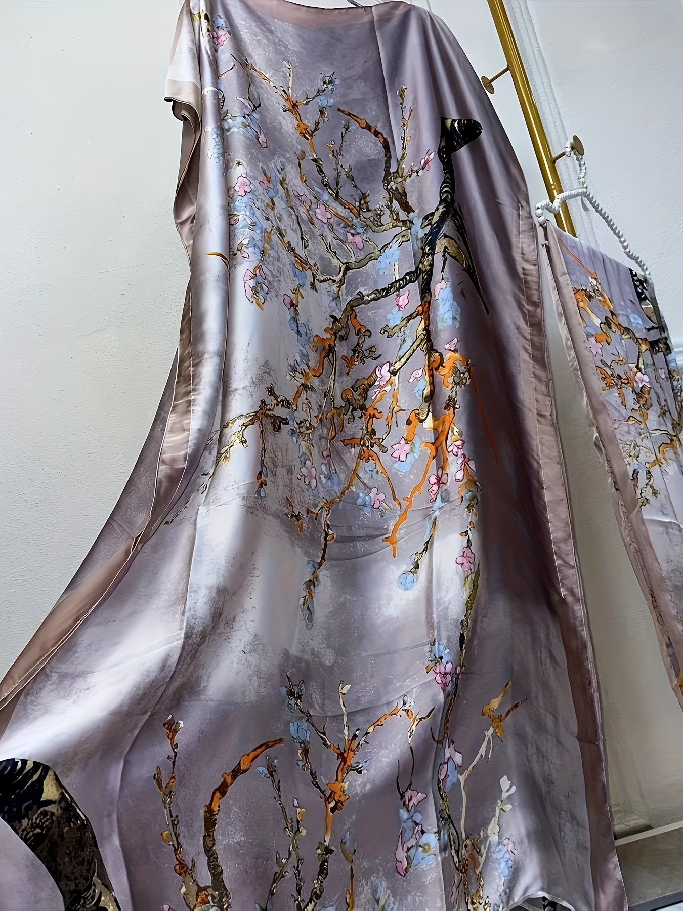 Elegant Floral Print Abaya Set with Batwing Sleeves and Draped Asymmetrical Hem