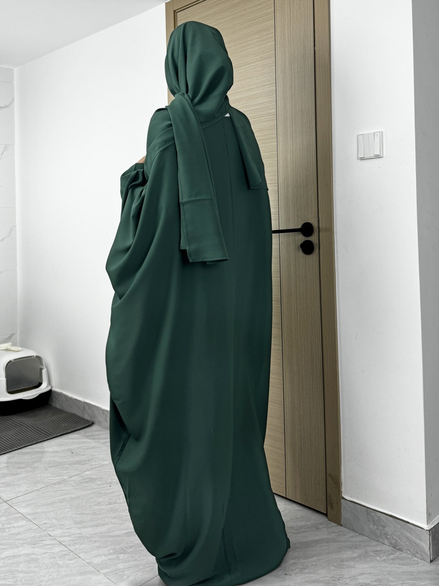 Set of 2 Muslim Jibab Abaya Dresses Featuring a Crew Neck And Batwing Sleeves, Including Hijabs, Designed for Women. These Loose-Fitting Maxi Dresses Are Suitable for Prayer And Everyday Wear.