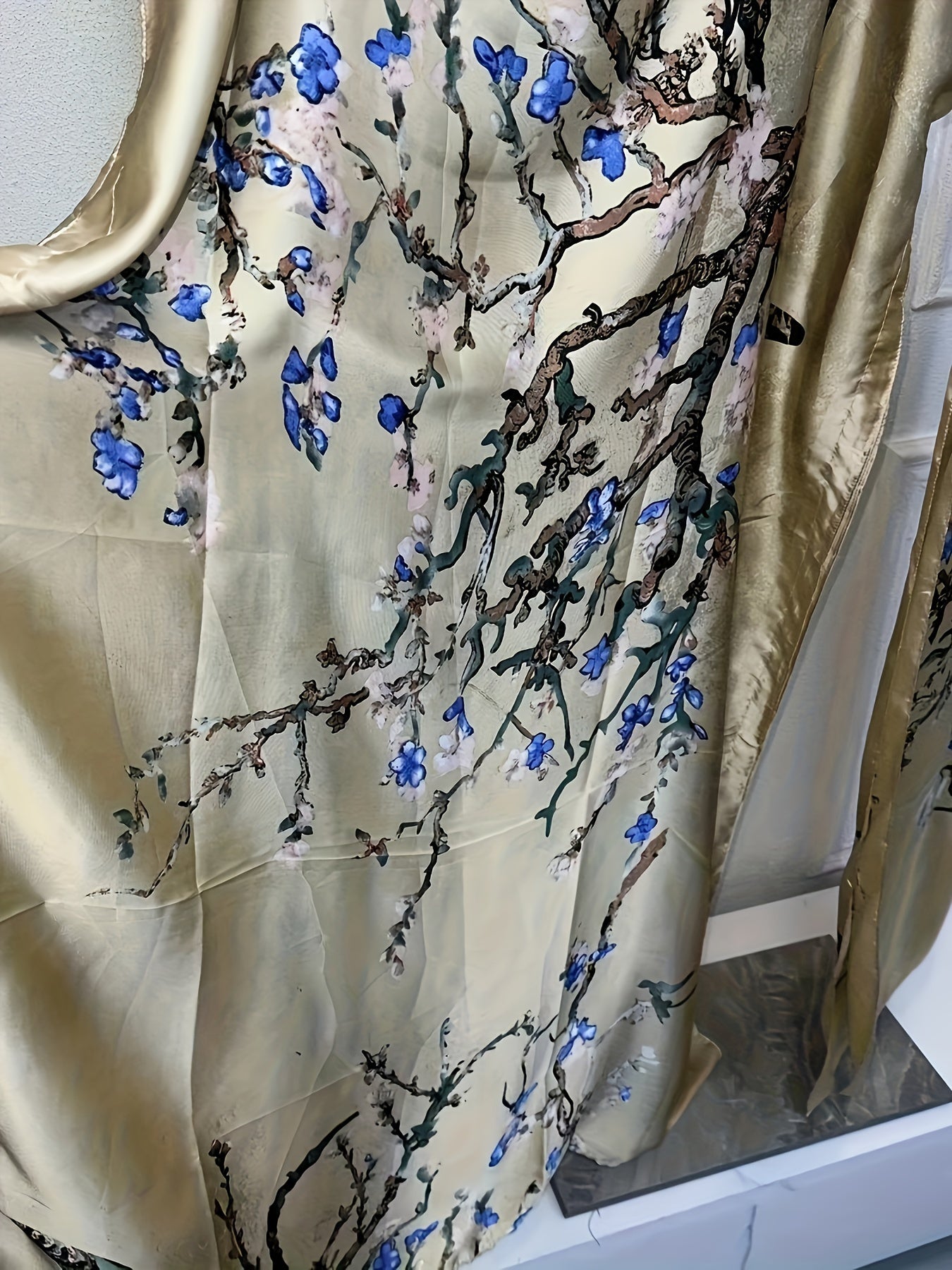 Elegant Floral Print Abaya Set with Batwing Sleeves and Draped Asymmetrical Hem