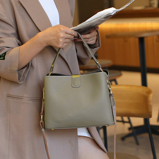 Advanced Grey Leather Satchel Elegant Women's Handbag, Cowhide Bag, Women's 2025 new trendy large capacity bucket bag, versatile commuting leather shoulder and crossbody handbag